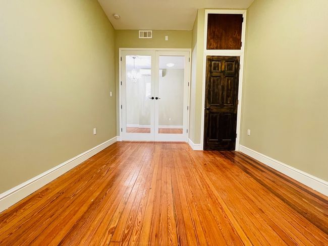 opposite view of the primary bedroom with closet. | Image 8