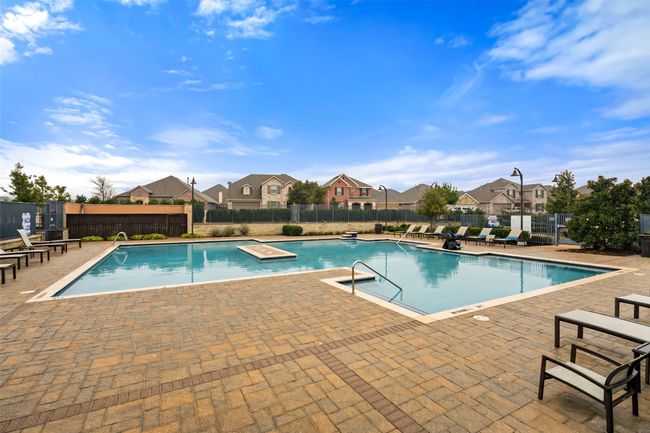 Community pool with lots of entertaining area | Image 25