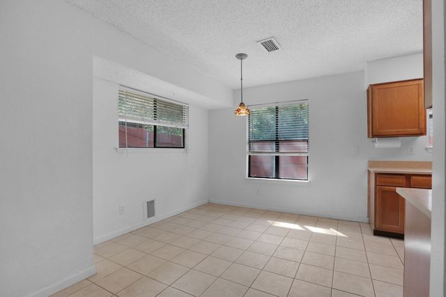 Dining Area with lots of natural light | Image 11