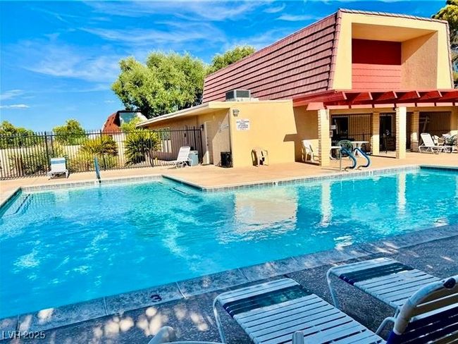 Community pool featuring a patio area | Image 52