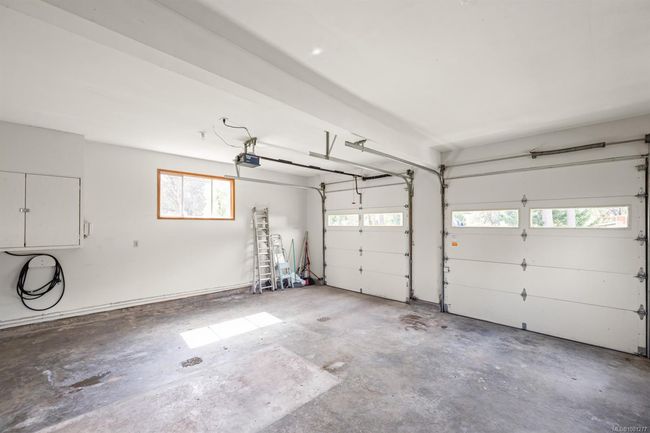 Garage with a garage door opener | Image 41