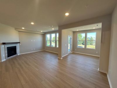 Beautiful luxury vinyl plank flooring throughout main level. | Image 2