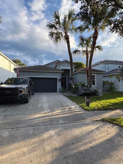 216 Seminole Lakes Dr, Royal Palm Beach, FL, 33411-4207 | Card Image