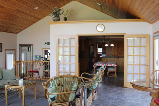 Above the double doors to kitchen is more space for decorating or pool storage. This space also lights up! | Image 31