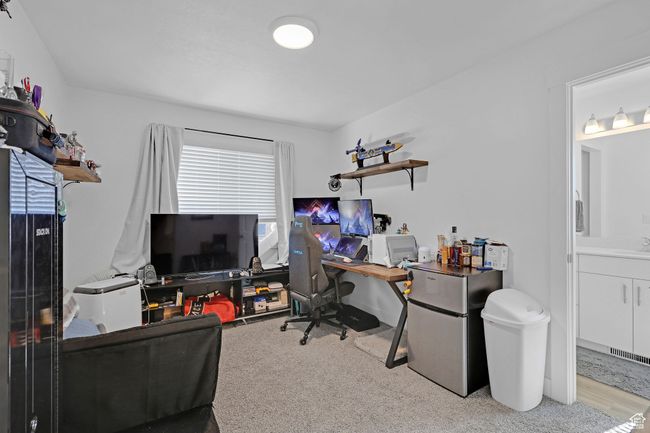 Office space with a sink and carpet flooring | Image 17