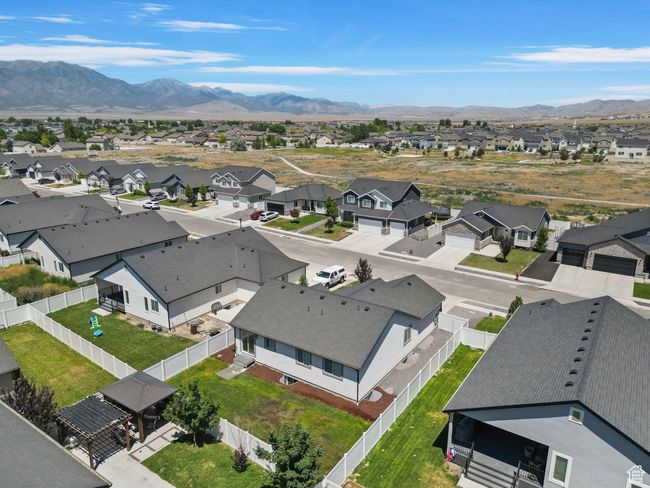 Aerial view of residential area featuring mountains | Image 34