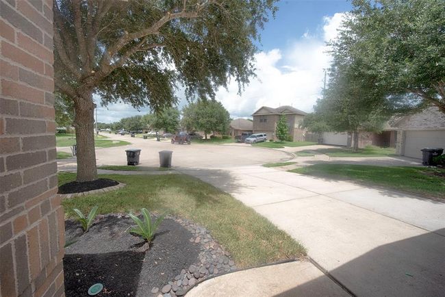 A view from the front porch of this lovely quiet neighborhood. Home is also very close to I35 for commuters. | Image 5
