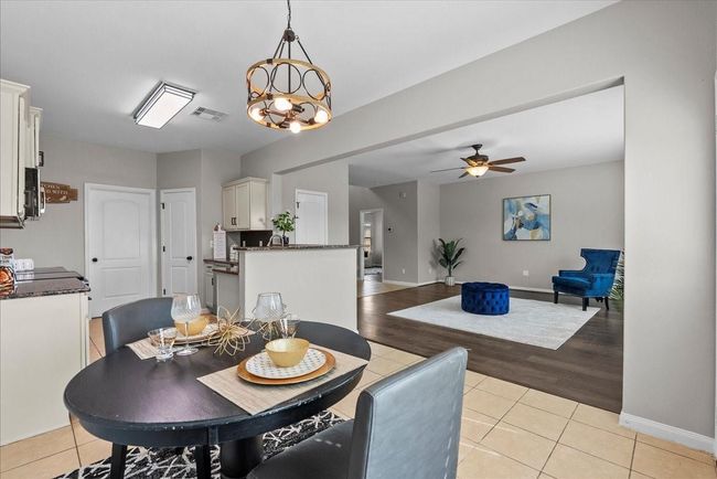 Whip up delicious meals and create lasting memories in this functional and beautifully designed kitchen. | Image 11
