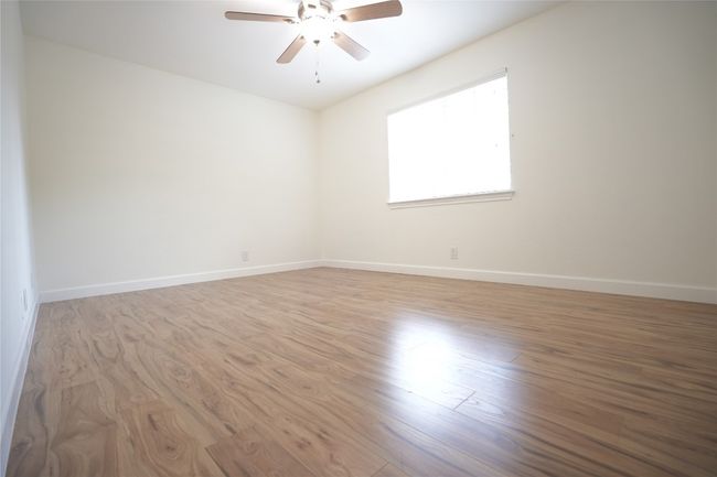 2nd floor bedroom1 featuring wood finished floors and ceiling fan | Image 15