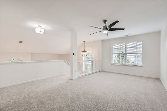 Empty room featuring carpet, ceiling fan, and baseboards | Image 36