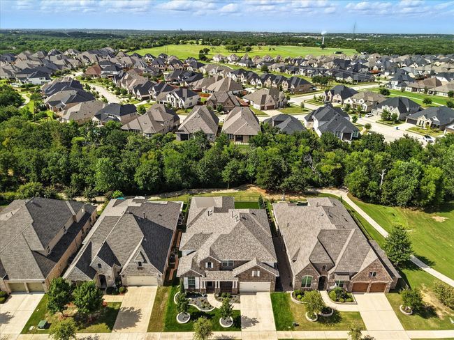 Aerial view of property and surrounding area featuring nearby suburban area | Image 35