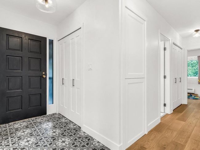 Entrance foyer featuring baseboards and light wood-type flooring | Image 14