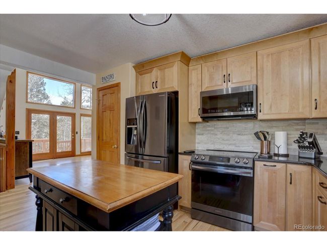 10438 Sunlight Ln, House other with 4 bedrooms, 3 bathrooms and null parking in Conifer CO | Image 13