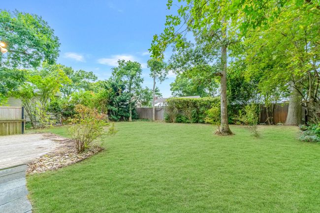 View of yard with a fenced backyard | Image 20