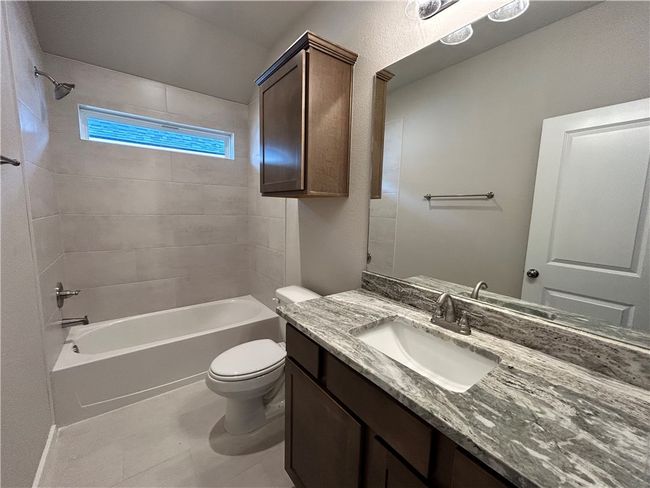 Full bath with vanity and shower / bath combination | Image 13
