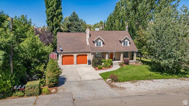 Front of home with a garage and a front yard | Image 46