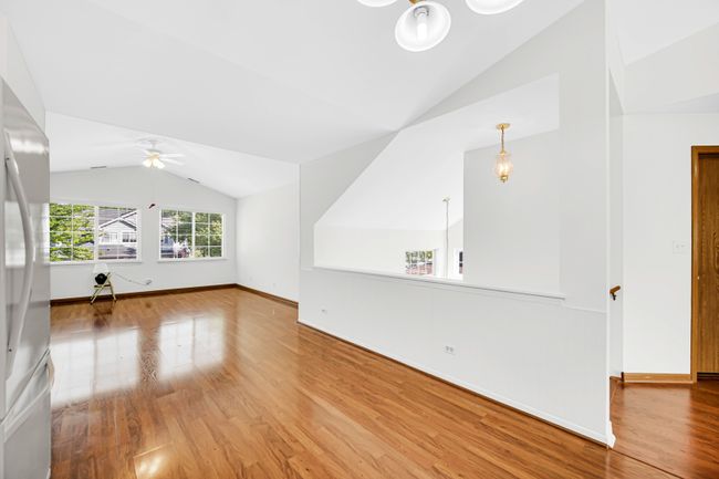 The family room is open to the kitchen and is the | Image 9