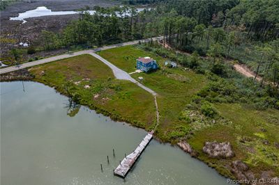 Birds eye view of property with a water view | Image 1