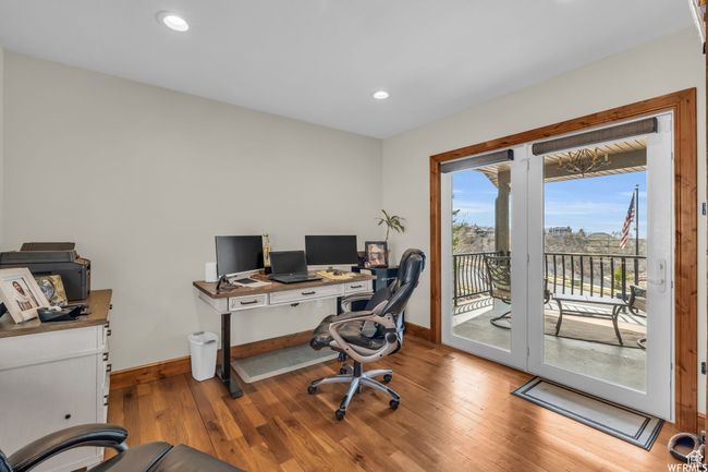 Office area featuring baseboards, recessed lighting, and light wood finished floors | Image 20