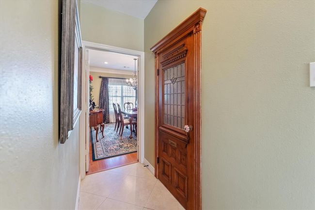 Antique wood and leaded glass door into the pantry | Image 13