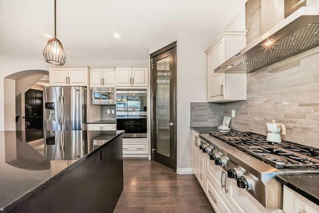 112 Rainbow Falls Passage, House other with 5 bedrooms, 4 bathrooms and 6 parking in Chestermere AB | Image 6
