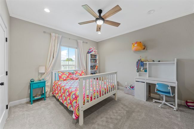 Bedroom with carpet flooring, baseboards, ornamental molding, and recessed lighting | Image 20