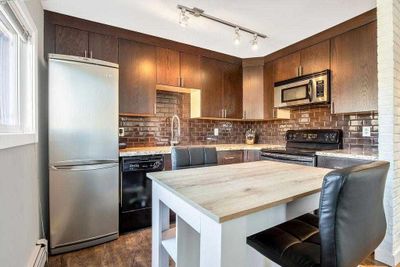 103 - 1811 18 A St Sw, Condo with 1 bedrooms, 1 bathrooms and 1 parking in Calgary AB | Image 1