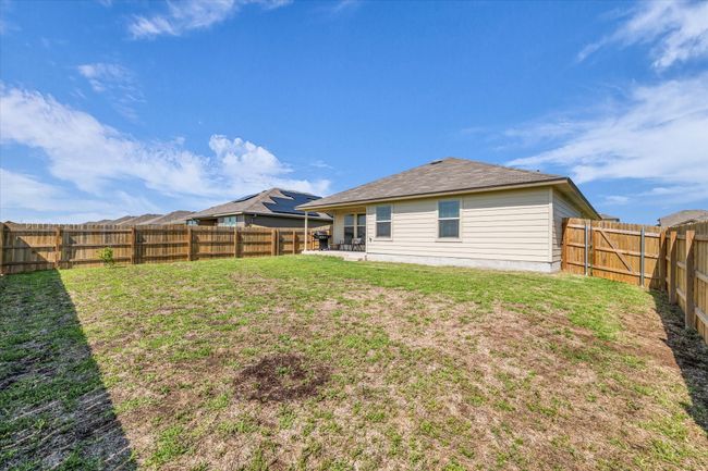 Rear view of house featuring a patio | Image 9