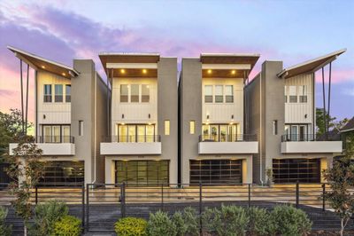 Showcasing sleek, modern lines and expansive windows, this property is designed for those who appreciate contemporary elegance. The prominent balcony offers an ideal spot to unwind and soak in Houston’s dynamic skyline views, creating an urban retreat right at home. | Image 1