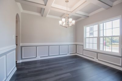 EXAMPLE>>>Large Formal Dining Room with Chair Railing, Wainscoting and a Coffered Ceiling! | Image 3