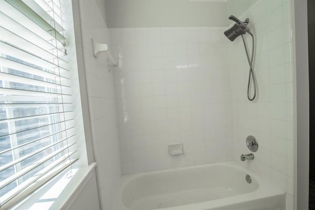 3rd full bath with tub & shower combo | Image 38