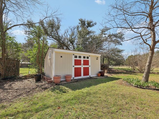 View of shed featuring fence | Image 35