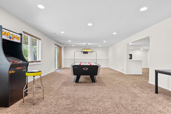 This room is so huge and walks out to the back yard | Image 47