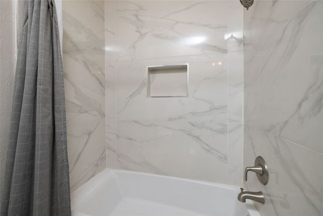 Bathroom with shower / tub combo with curtain | Image 34