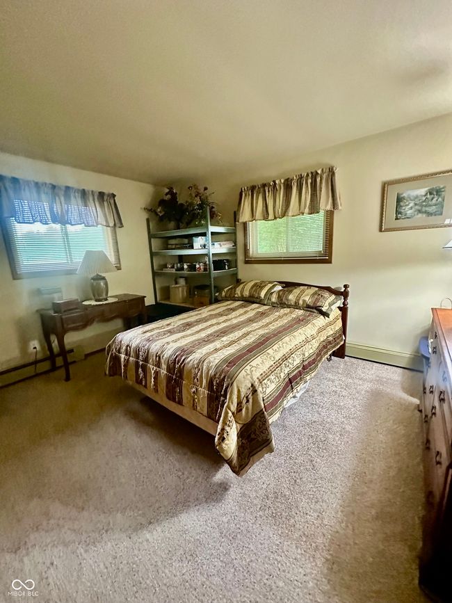 bedroom featuring carpet | Image 27