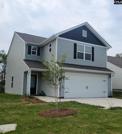 Charming two-story home with 3 bedrooms and two baths. | Image 1