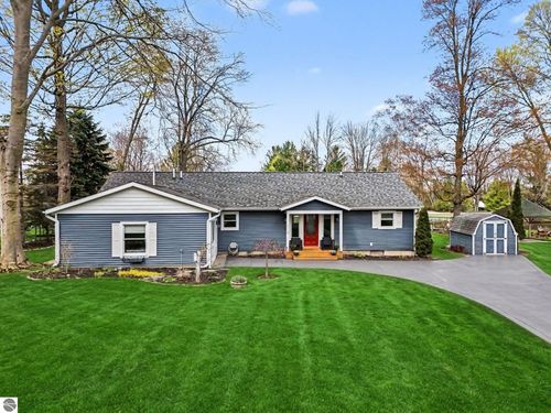 3718 Peninsular Shores Dr, Grawn, MI, 49637-9720 | Card Image