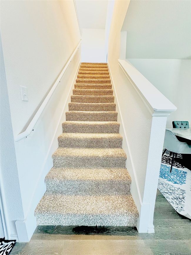 Staircase with wood finished floors | Image 14