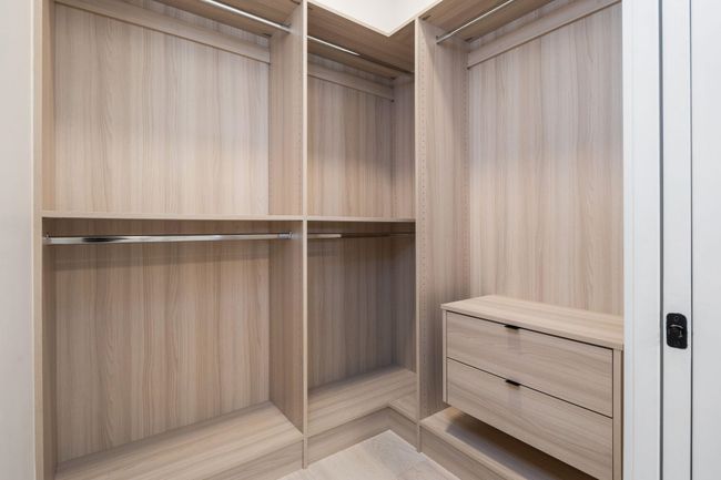 View of spacious closet | Image 17