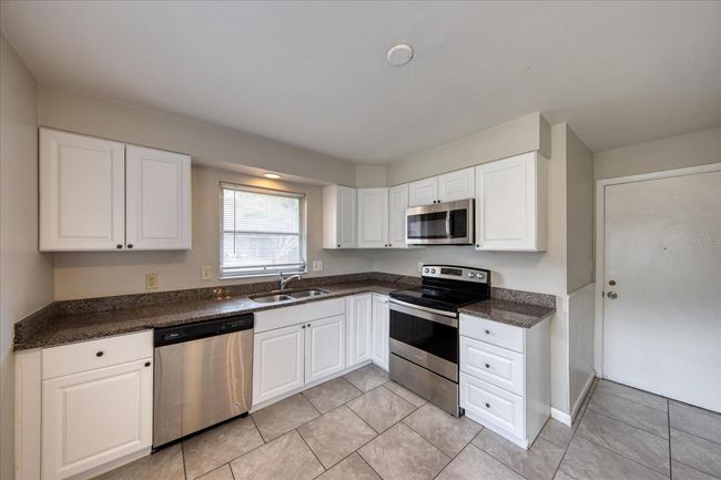 1901 Dolphin Dr, House other with 3 bedrooms, 2 bathrooms and null parking in BELLEAIR BLUFFS FL | Image 8