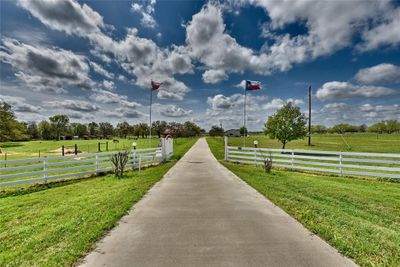 Long concrete driveway entrance -- privacy from Hwy 290 but close access! | Image 2