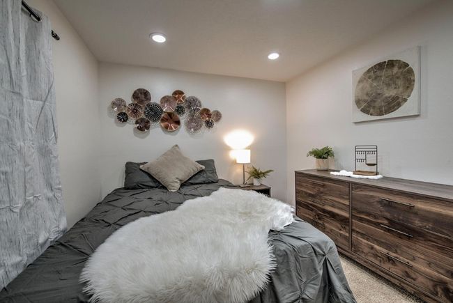 Carpeted bedroom with recessed lighting | Image 22