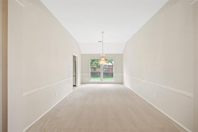 Dining room with chandalier | Image 8