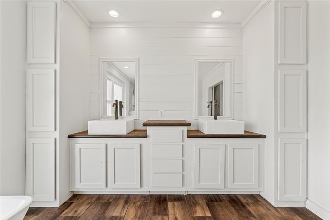 Bathroom with dark wood-style floors and recessed lighting | Image 17