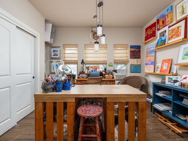 Currently an art room with built-ins. Can be a study or 2nd living area. | Image 18