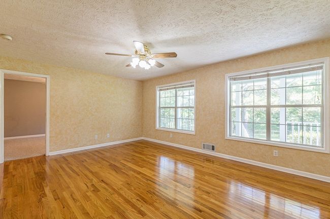 1130 Coan Dr, Home with 3 bedrooms, 2 bathrooms and null parking in Locust Grove GA | Image 5