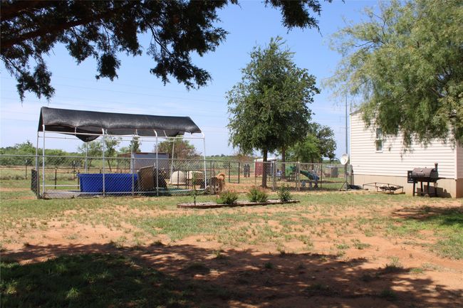 View of yard with a carport | Image 11