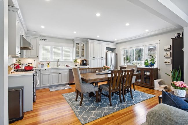 Dining room featuring recessed lighting, light wood-style floors, and ornamental molding | Image 9