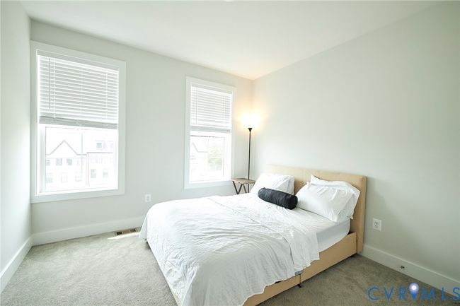 Bedroom featuring carpet and baseboards | Image 22