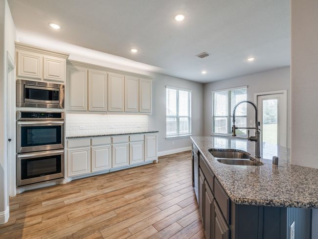 1517 Port Millstone Trl, House other with 4 bedrooms, 3 bathrooms and null parking in St Paul TX | Image 13
